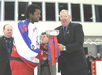 Ray Accepting Trophy: